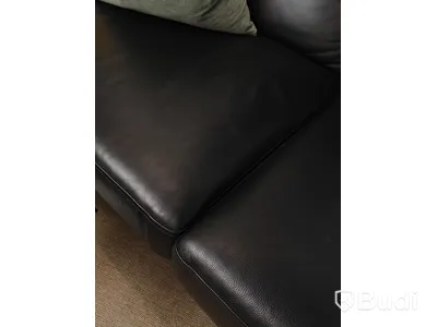 Soffa svart skinn
