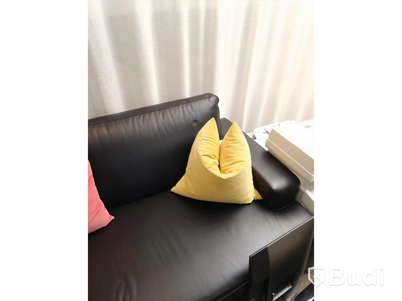 Soffa svart skinn