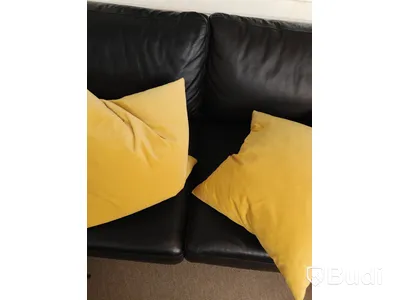 Soffa svart skinn