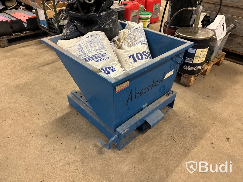Tippcontainer med absorberingsmedel.