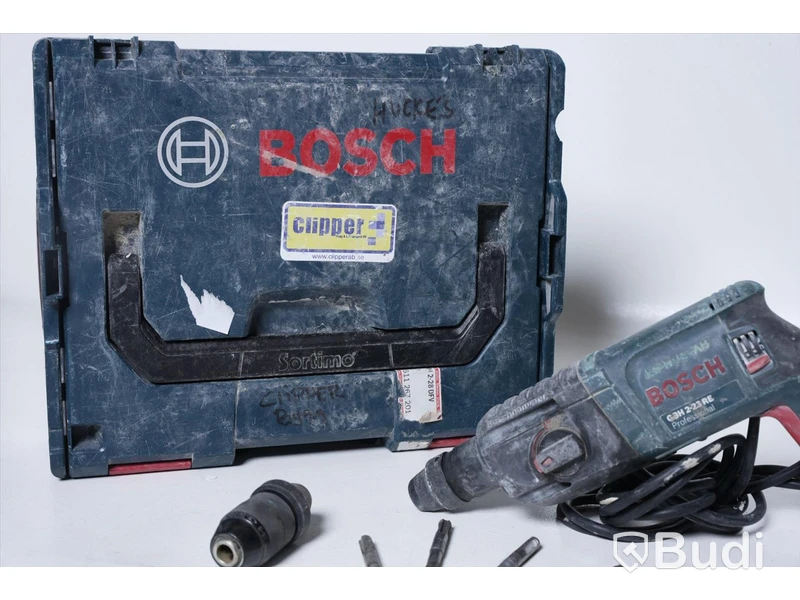 Borrhammare BOSCH GBH 2-23 RE, med förvaringslåda, extra borrhuvud och några bits.