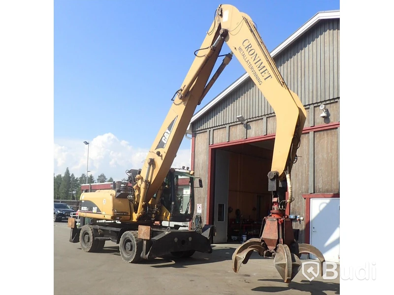 Caterpillar M322c Materialhanterare