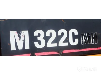 Caterpillar M322c Materialhanterare