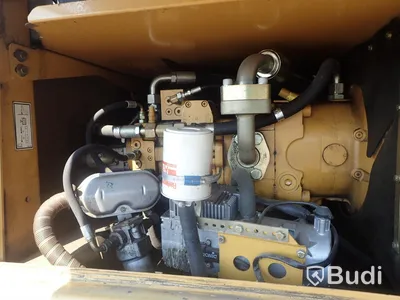 Caterpillar M322c Materialhanterare