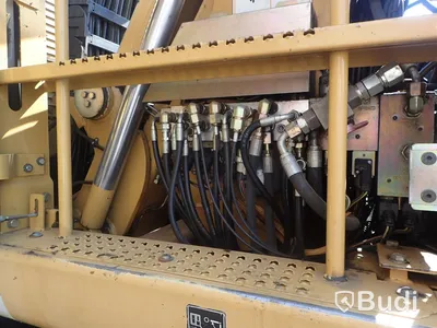 Caterpillar M322c Materialhanterare