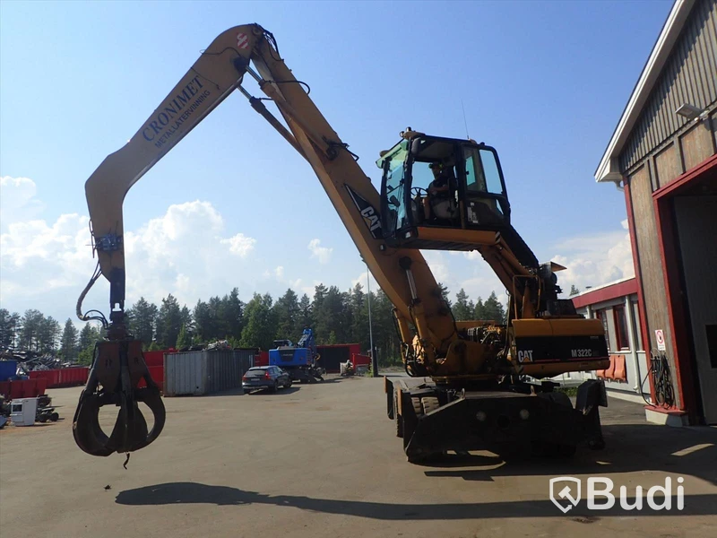 Caterpillar M322c Materialhanterare