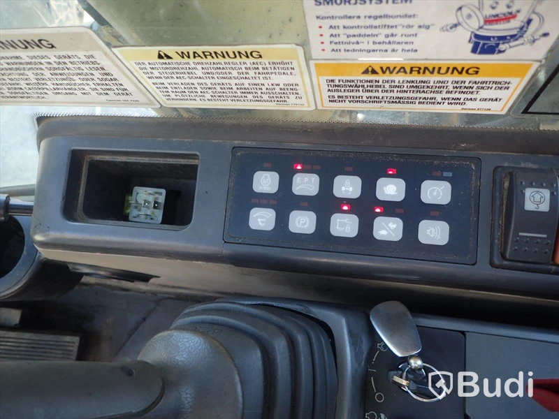 Caterpillar M322c Materialhanterare
