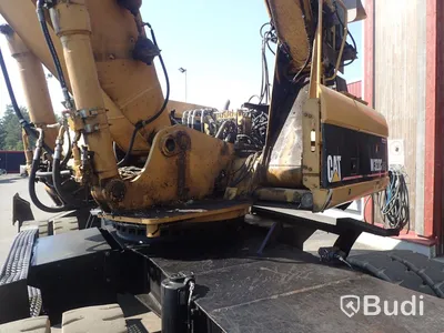 Caterpillar M322c Materialhanterare