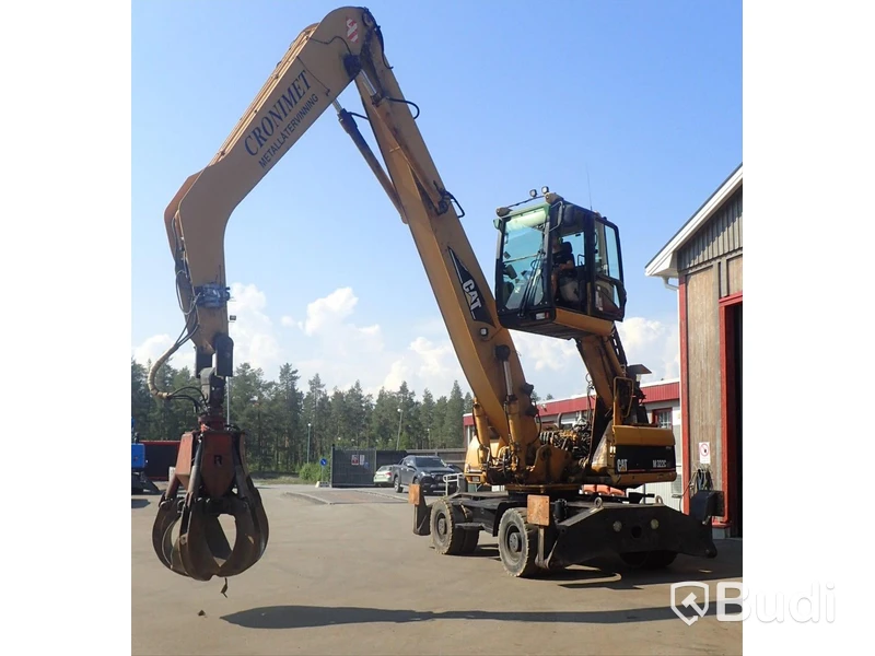 Caterpillar M322c Materialhanterare