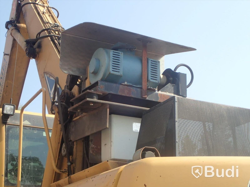 Caterpillar M322c Materialhanterare
