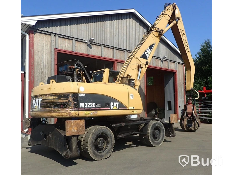Caterpillar M322c Materialhanterare