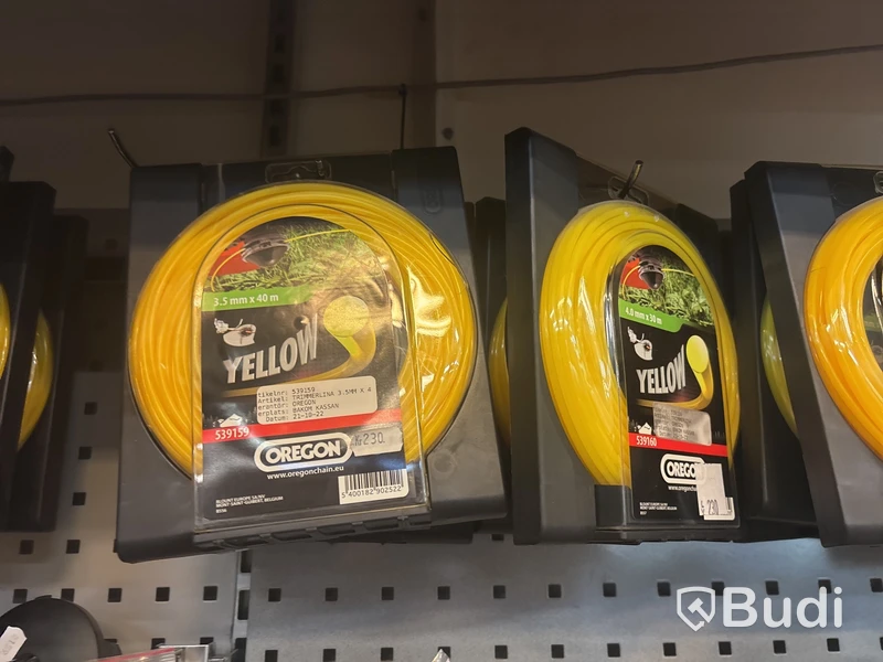 Parti trimmertråd, sågkedjor, svärd, tändstift m.m