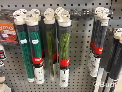 Parti trimmertråd, sågkedjor, svärd, tändstift m.m