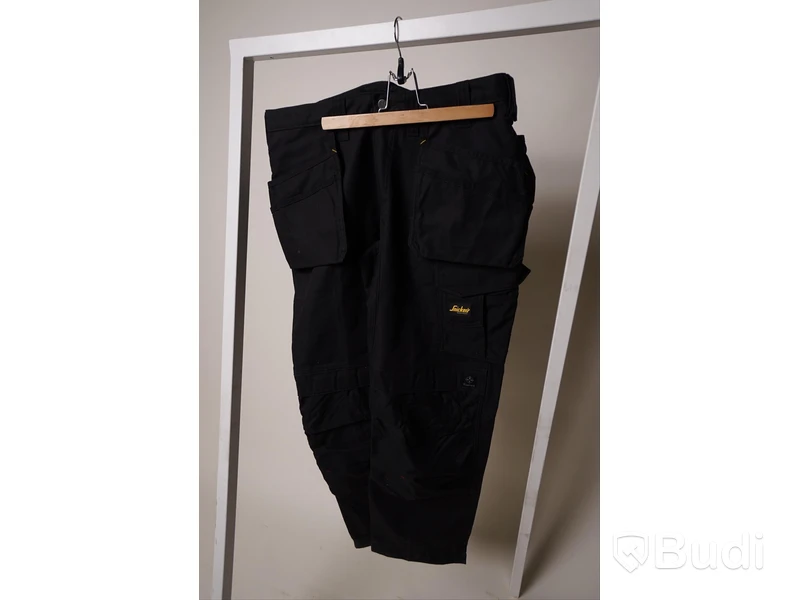 Arbetsbyxor strl 52, 2 t-shirts strl XL