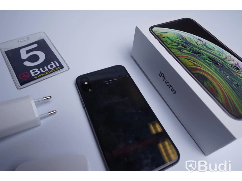 Iphone XS 64 GB med sprucken baksida, i kartong med laddare och headset