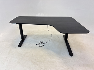 Höj- och sänkbart hörnskrivbord Ikea, Bekant