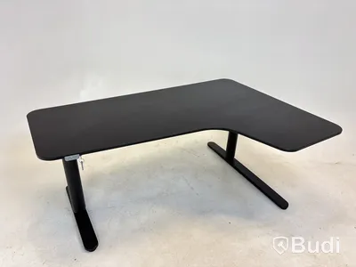 Höj- och sänkbart hörnskrivbord Ikea, Bekant
