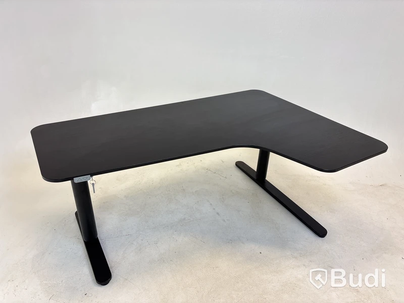 Höj- och sänkbart hörnskrivbord Ikea, Bekant