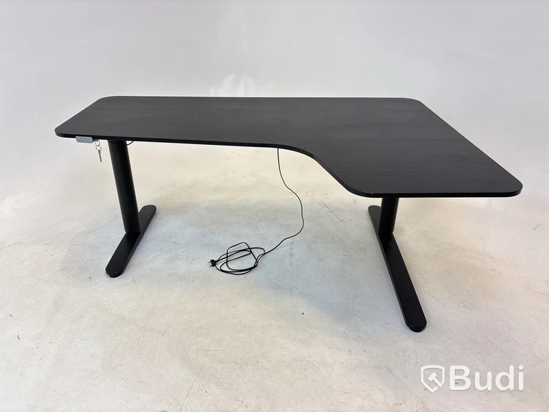 Höj- och sänkbart hörnskrivbord Ikea, Bekant