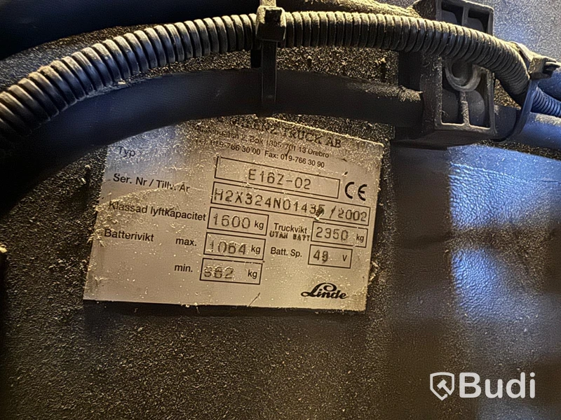 Truck Linde E16Z-02 med laddare och förlängningsgafflar