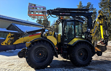 Traktorgrävare Huddig 1260C Rail