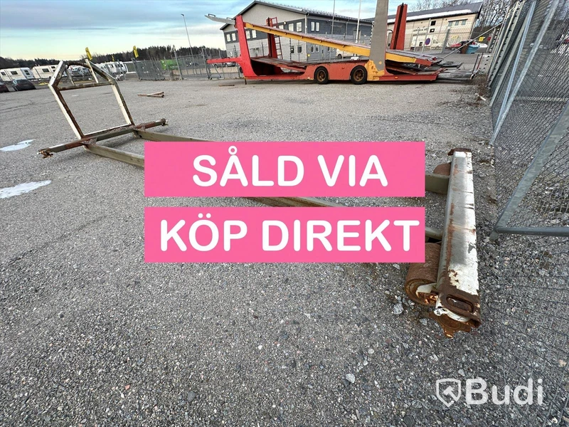 Lastväxlarram med containerfäste