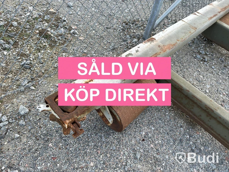 Lastväxlarram med containerfäste