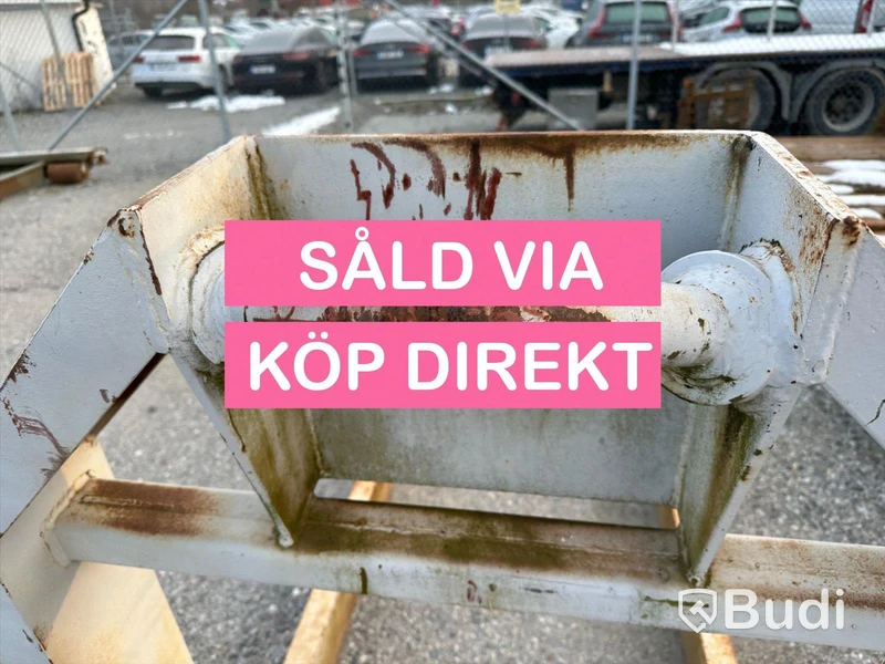 Lastväxlarram med containerfäste