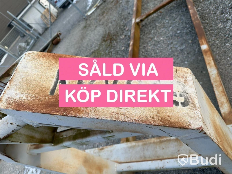 Lastväxlarram med containerfäste