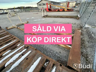 Lastväxlarram med containerfäste