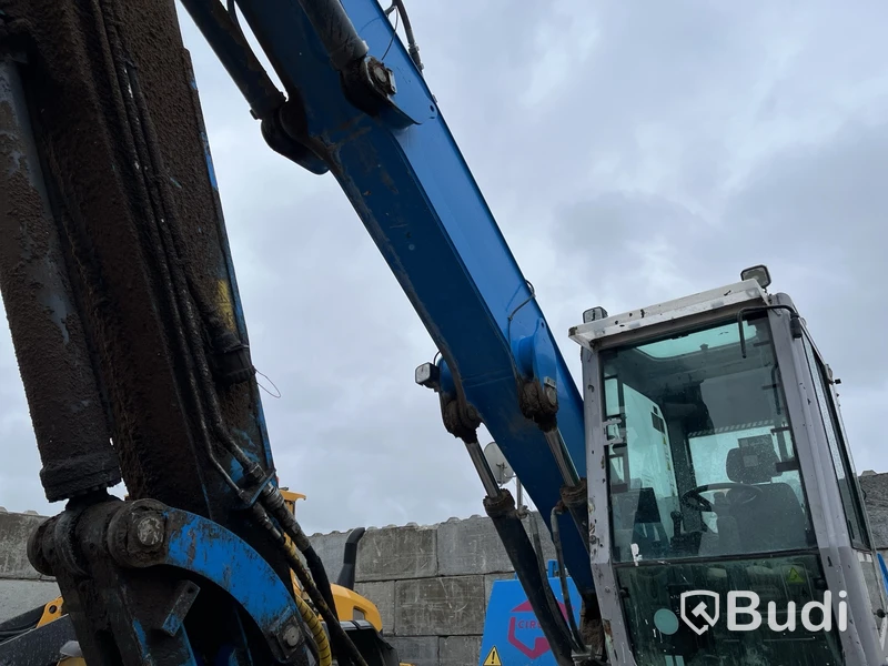 Materialhanterare med Grip Fuchs MHL 320 -2015  | Höj- och sänkbar hytt