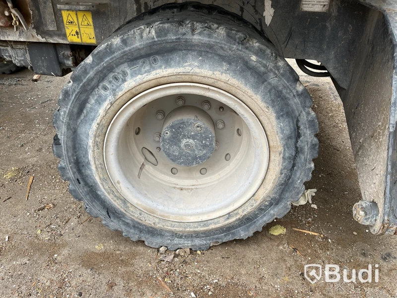 Materialhanterare med Grip Fuchs MHL 320 -2015  | Höj- och sänkbar hytt
