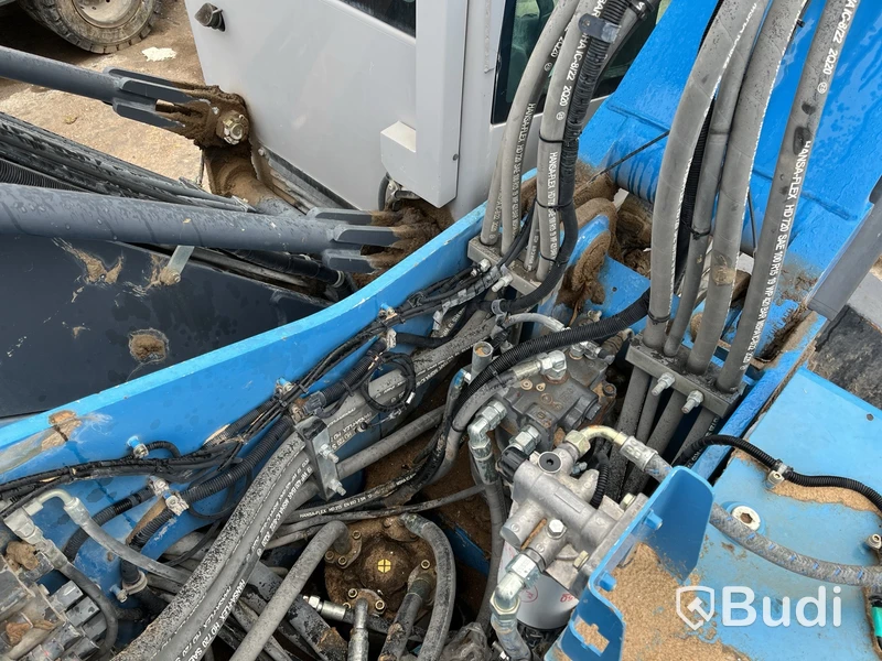 Materialhanterare med Grip Fuchs MHL 320 -2015  | Höj- och sänkbar hytt