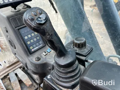 Materialhanterare med Grip Fuchs MHL 320 -2015  | Höj- och sänkbar hytt
