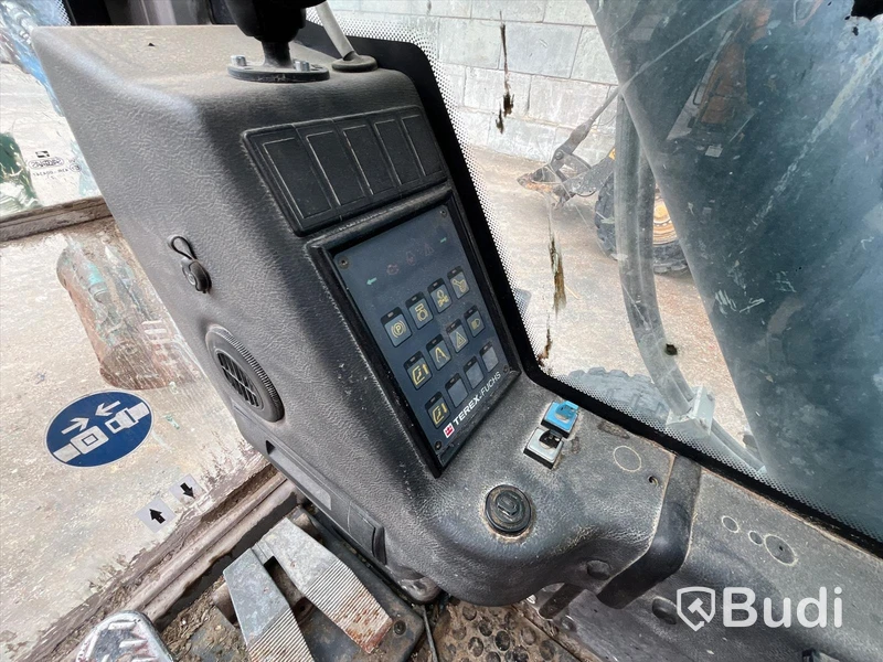 Materialhanterare med Grip Fuchs MHL 320 -2015  | Höj- och sänkbar hytt