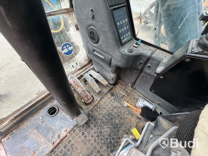 Materialhanterare med Grip Fuchs MHL 320 -2015  | Höj- och sänkbar hytt