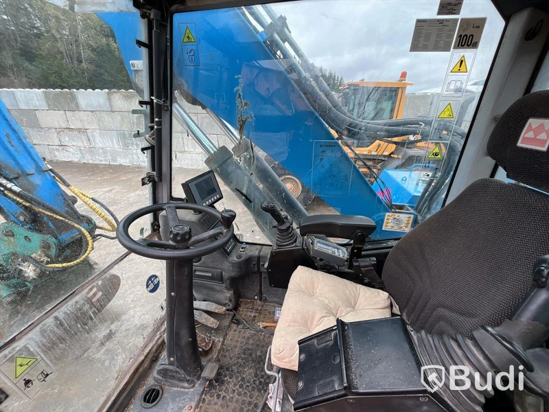 Materialhanterare med Grip Fuchs MHL 320 -2015  | Höj- och sänkbar hytt