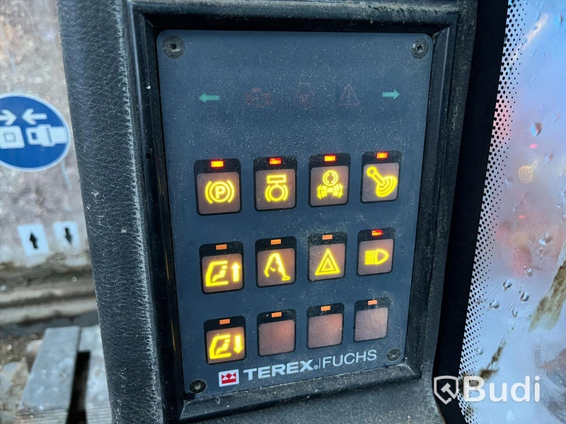 Materialhanterare med Grip Fuchs MHL 320 -2015  | Höj- och sänkbar hytt