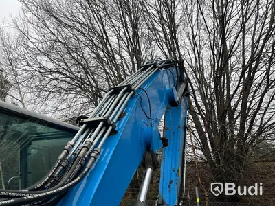 Materialhanterare med Grip Fuchs MHL 320 -2015  | Höj- och sänkbar hytt
