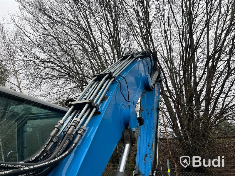 Materialhanterare med Grip Fuchs MHL 320 -2015  | Höj- och sänkbar hytt