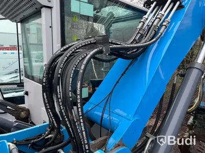 Materialhanterare med Grip Fuchs MHL 320 -2015  | Höj- och sänkbar hytt