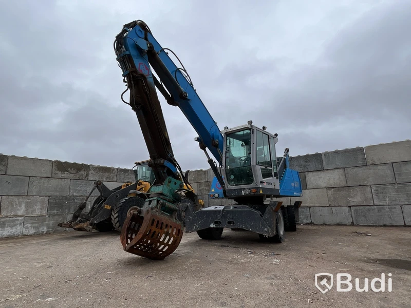 Materialhanterare med Grip Fuchs MHL 320 -2015  | Höj- och sänkbar hytt