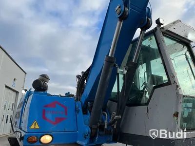 Materialhanterare Fuchs MHL 320 -2015 | Grip | Höj- och sänkbar hytt