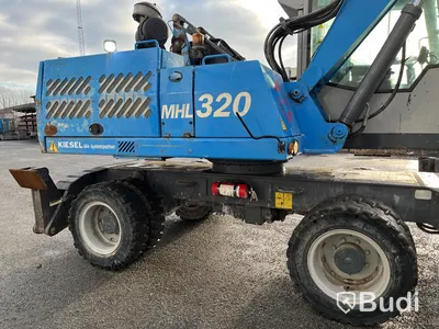 Materialhanterare Fuchs MHL 320 -2015 | Grip | Höj- och sänkbar hytt