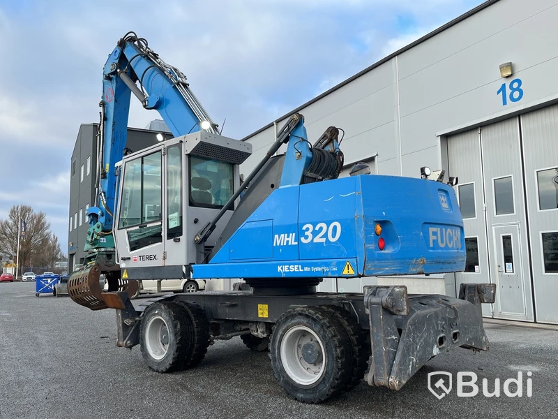 Materialhanterare Fuchs MHL 320 -2015 | Grip | Höj- och sänkbar hytt