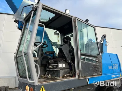Materialhanterare Fuchs MHL 320 -2015 | Grip | Höj- och sänkbar hytt
