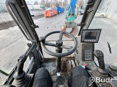 Materialhanterare Fuchs MHL 320 -2015 | Grip | Höj- och sänkbar hytt