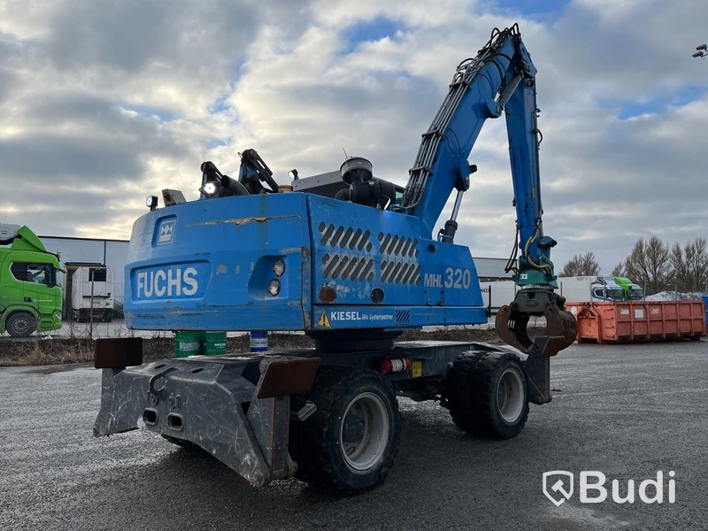 Materialhanterare Fuchs MHL 320 -2015 | Grip | Höj- och sänkbar hytt