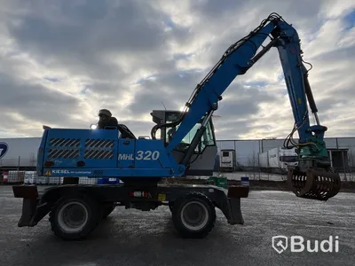 Materialhanterare Fuchs MHL 320 -2015 | Grip | Höj- och sänkbar hytt