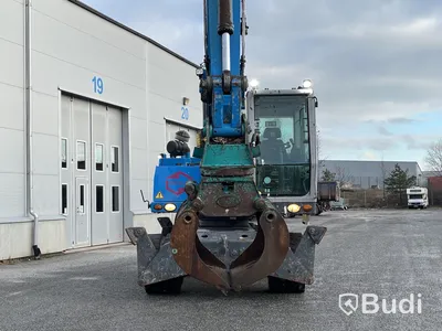 Materialhanterare Fuchs MHL 320 -2015 | Grip | Höj- och sänkbar hytt